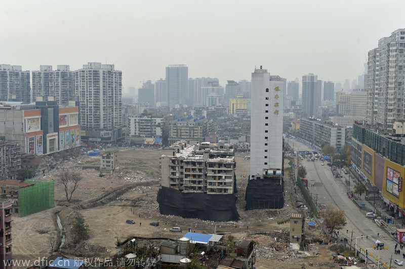 Wuhan brings down building with controlled blasting