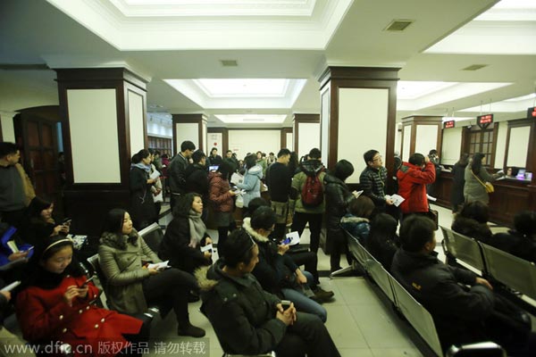 People line up for license plates in Shanghai