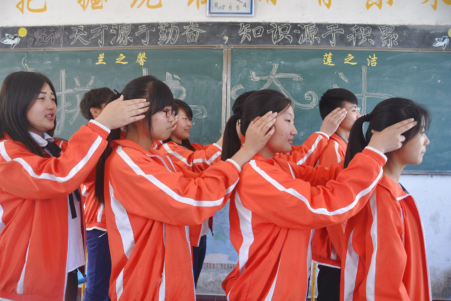 Balloons, paper planes and massages help students relax before college exam