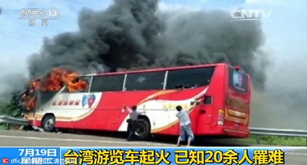 26 die after tour bus catches fire on highway in Taiwan