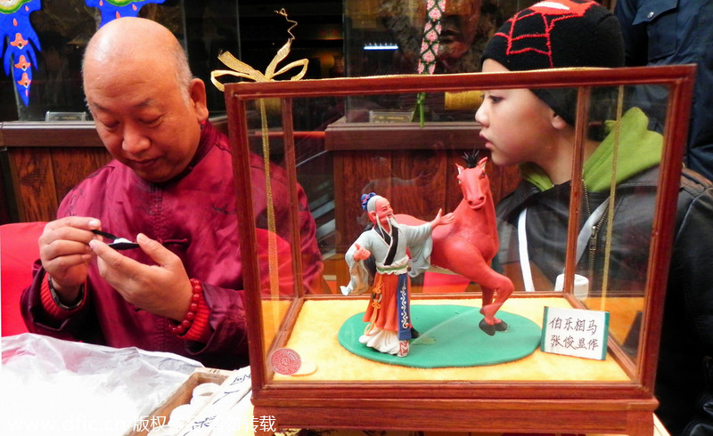 Folk artists display skills at temple fair