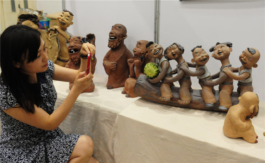 Vivid pottery figurines exhibited in Shandong