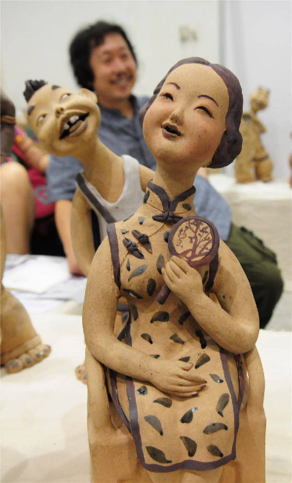 Vivid pottery figurines exhibited in Shandong