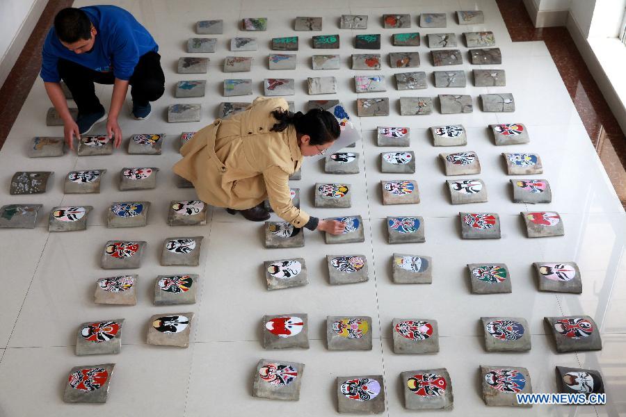 Tile paintings created in Shandong, E China