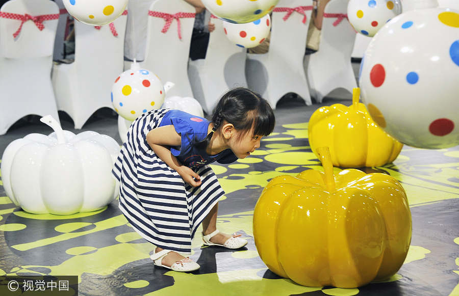 Japanese artist Kusama displays her polka dot artworks in Fuzhou