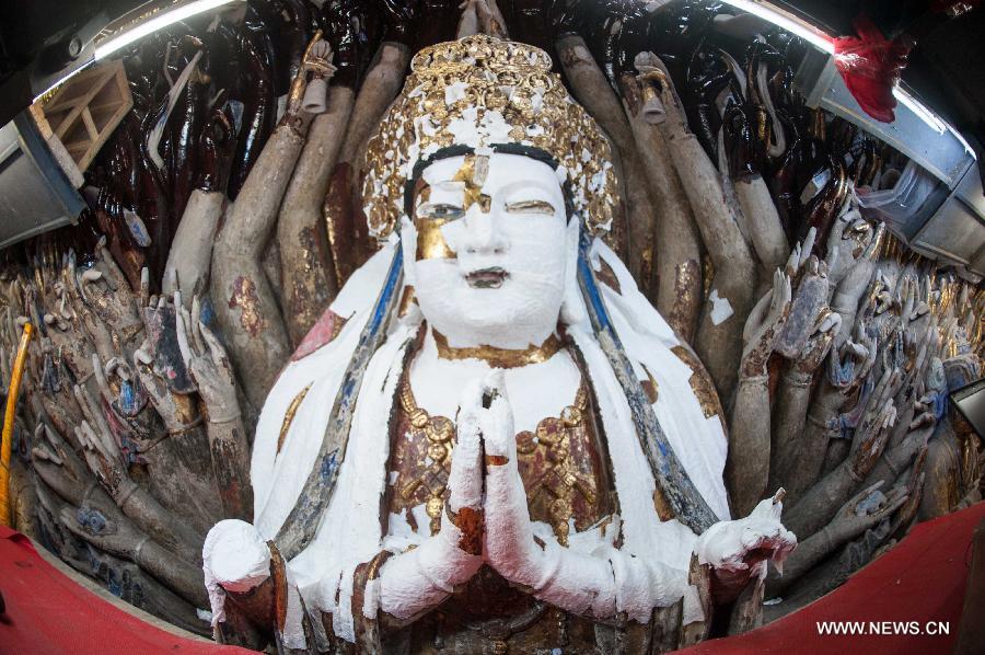 Restoration for sculpture of Qianshou Guanyin underway in Chongqing