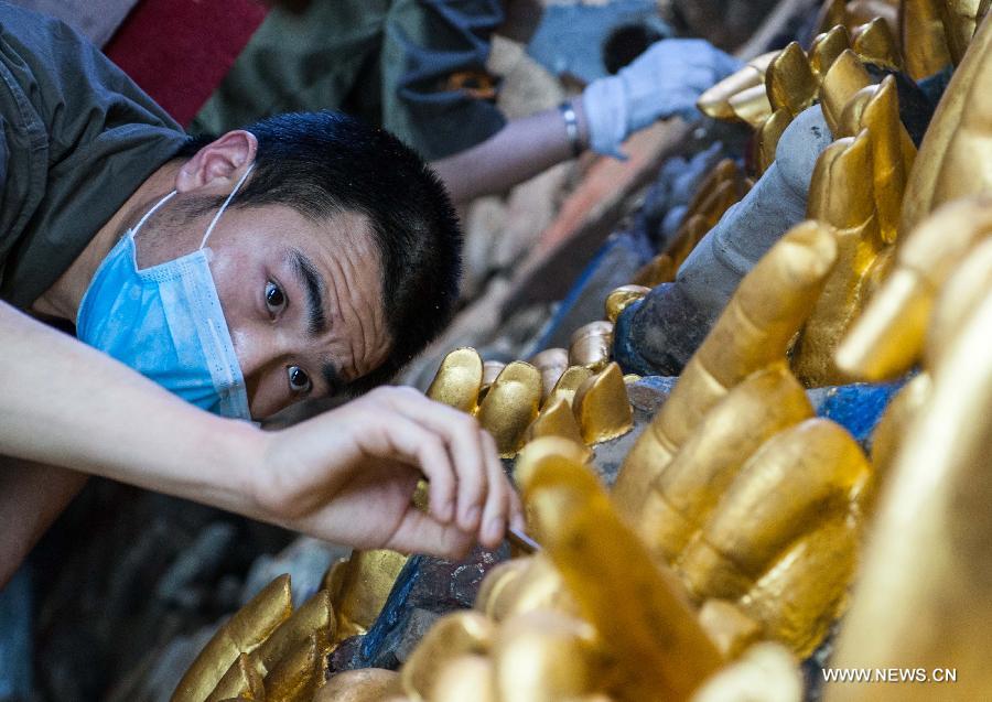 Restoration for sculpture of Qianshou Guanyin underway in Chongqing