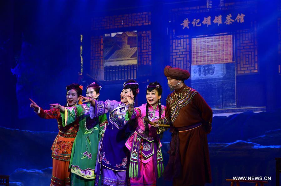 Actors perform folk musical drama in C China's Hubei