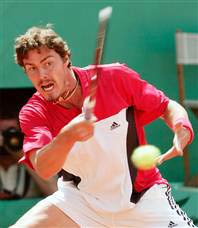 Fifth-seeded Marat Safin cruised to a 6-2, 6-4 win over Kevin Kim on Friday and advanced to the semifinals of the China Open in Beijing. [Reuters]