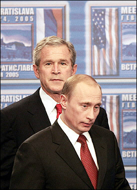 US President George W. Bush (news - web sites) (L) and Russian President Vladimir Putin (news - web sites) arrive for a joint press conference in Bratislava, Slovakia.(AFP/Maxim Marmur) 