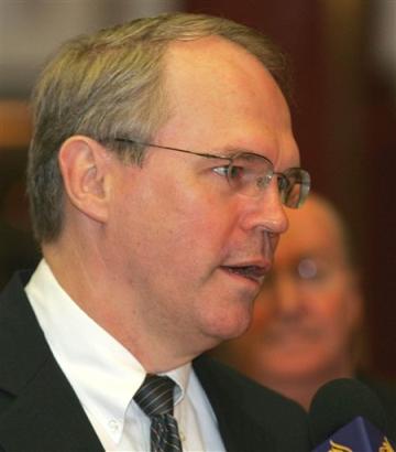 U.S. Assistant Secretary of State Christopher Hill speaks to journalists before leaving his hotel in Beijing Wednesday, April 27, 2005.