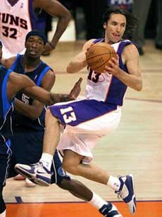 Phoenix Suns' Steve Nash looks to pass during the second quarter of Game 5 of their Western Conference semifinal series Wednesday, May 18, 2005, against the Dallas Mavericks at America West Arena in Phoenix. The Suns won 114-108 to go up 3-2 behind Nash's 34 points. (AP