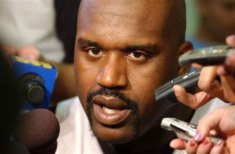 Miami Heat center Shaquille O'Neal talks to the media Saturday, May 21, 2005 in Miami, after a Heat practice session. The Heat will play the Detroit Pistons in the Eastern Conference Finals. 