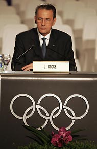 International Olympic Committee President Jacques Rogge speaks at a news conference after London won the 2012 Olympic Games bid in Singapore July 6, 2005.