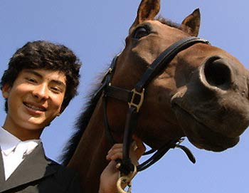 Chinese teenager Alex Hua Tian becomes the first rider from the country to compete in a European equestian event when he saddles up for the opening event of the 2005/2006 season here in Normandy this weekend. [AFP] 