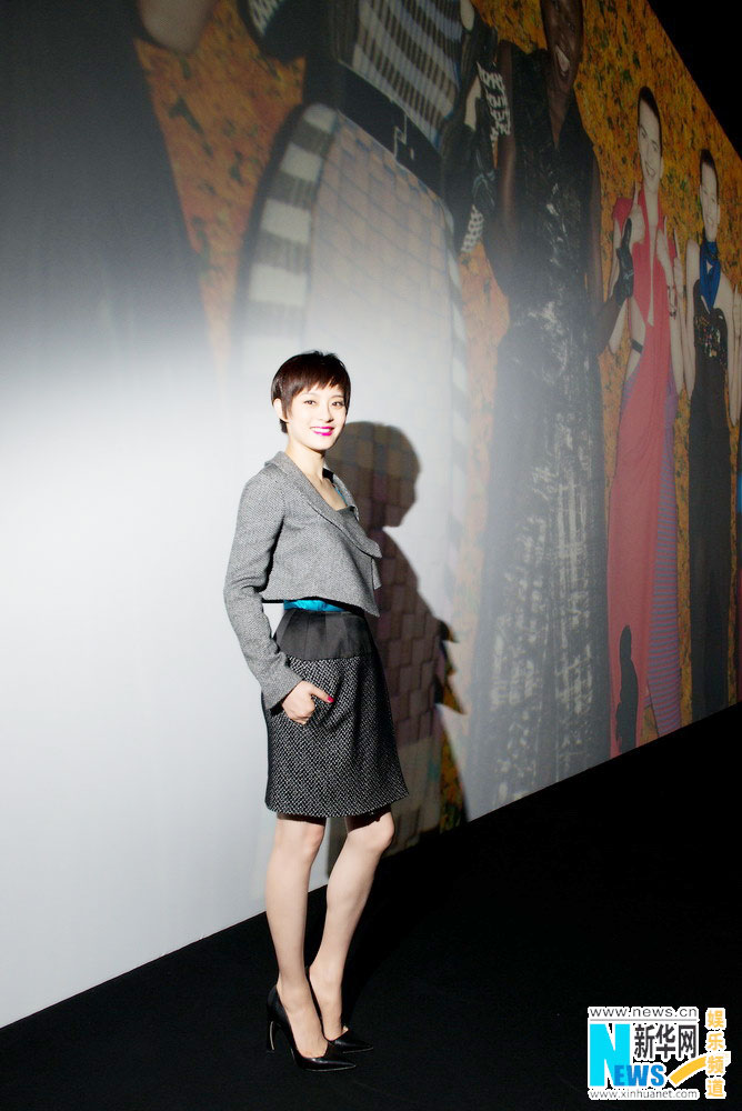 Sun Li watches fashion show in Paris