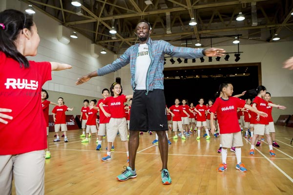 Bolt celebrates PUMA's new shoes designed by Chinese artist