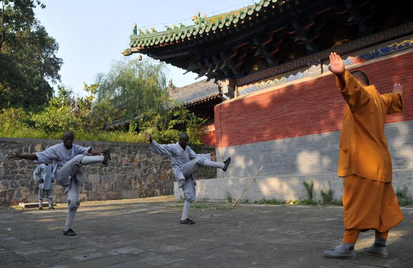 African apprentices practise kungfu at Shaolin Temple