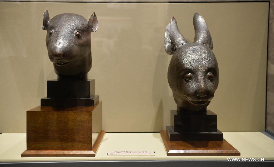 Rat, rabbit head sculptures on display