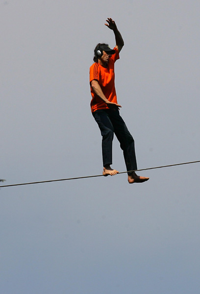 American walks 200m-high tightrope