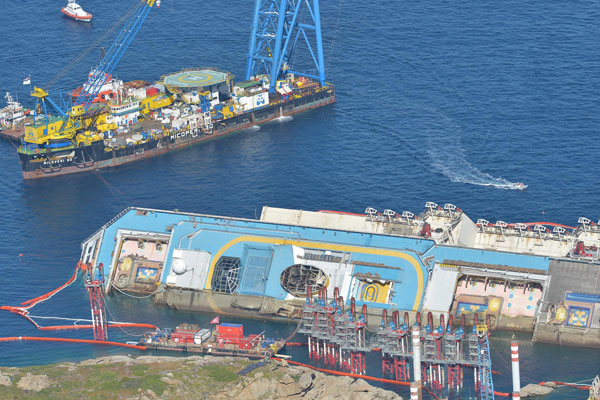 Shipwrecked Concordia declared vertical off Italy