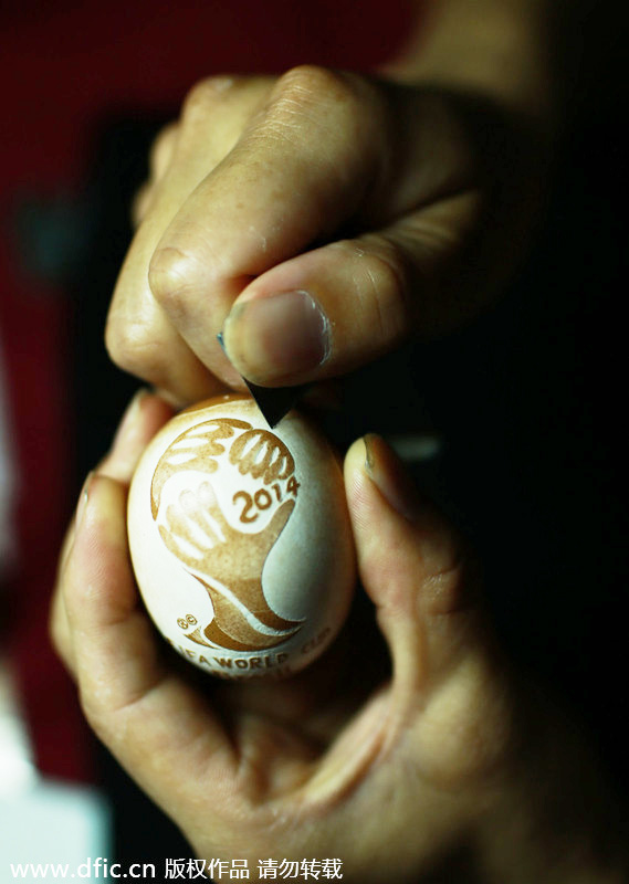 Carving a World Cup on an egg