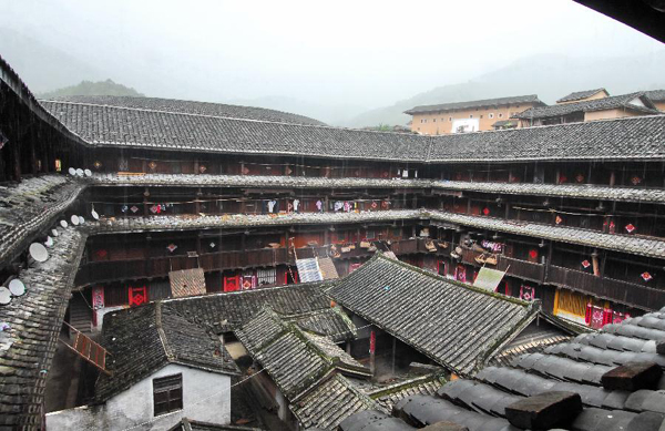 Tourists visit Tulous in Yongding, China's Fujian