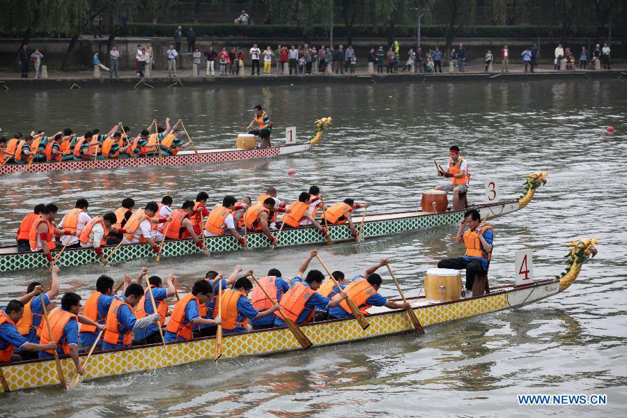 Dragon boats race on Qinhuai River in Nanjing