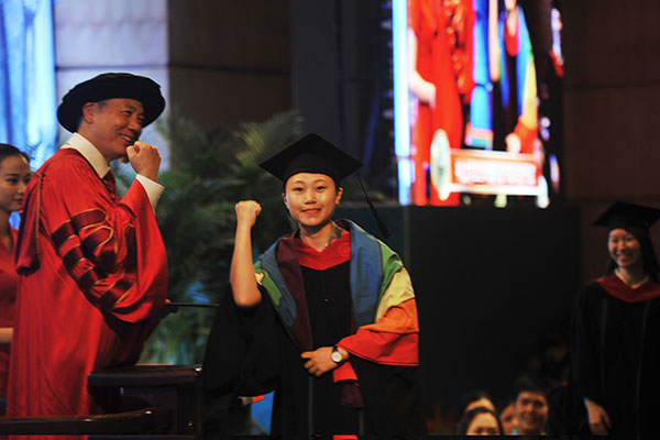 Young woman comes out at graduation ceremony