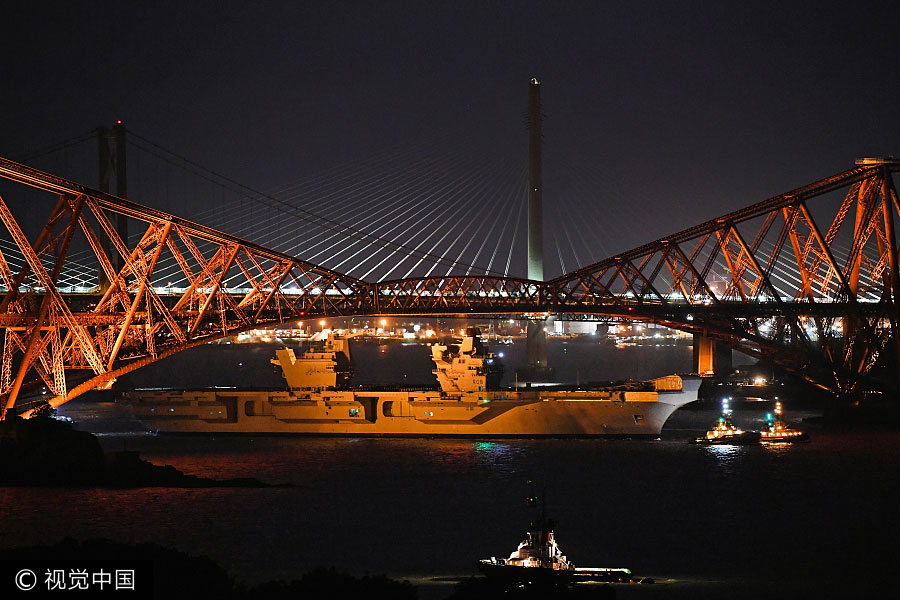 Royal Navy's biggest ever warship finally heads for high seas for trials